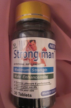 قوي ترين قرص تاخيري, تضميني Strong Man-ا